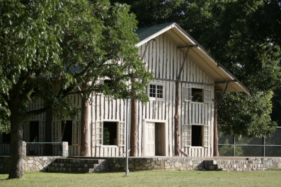 Rec HallThis historical building was constructed in 1927 from the local Cypress trees.  Rec Hall serves as the general meeting location for several daily activities as well as most evening activities.  (more photos)